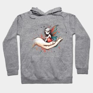 Woman Cradling Fairy in Palm Of Hand Watercolor Design | Light Hoodie